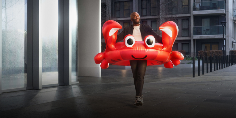 Man With Inflatable Crab
