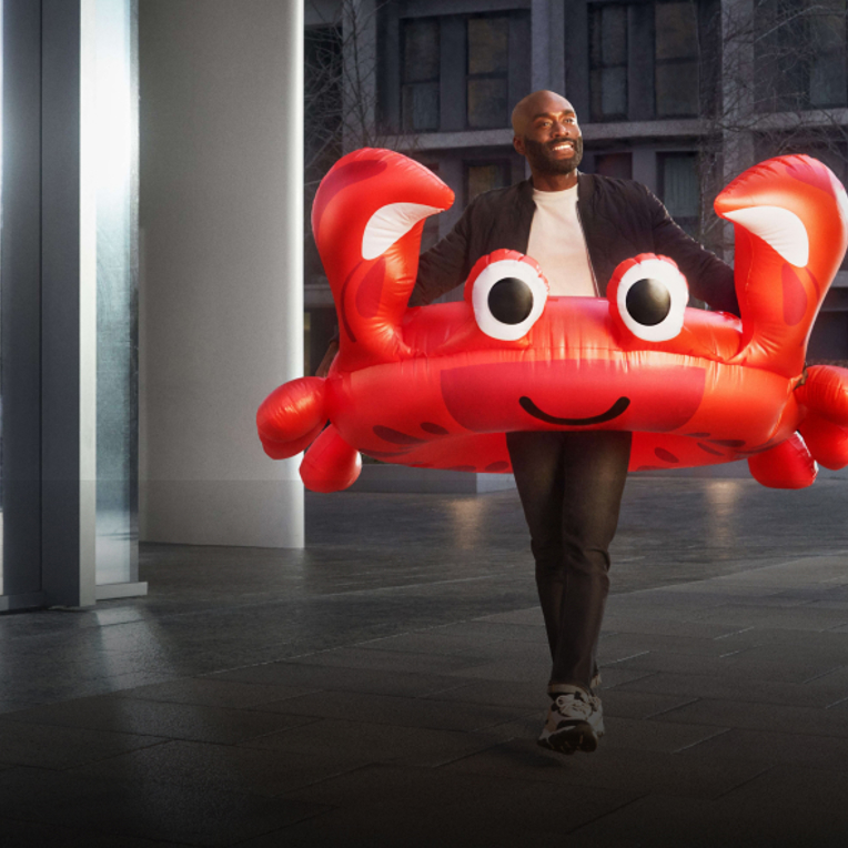 Man With Inflatable Crab